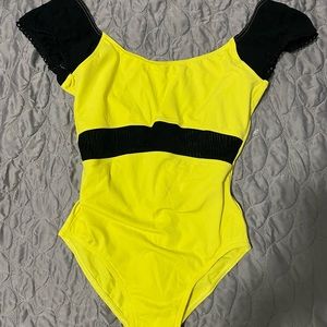 Cheery yellow leotard with black trim, adult size small